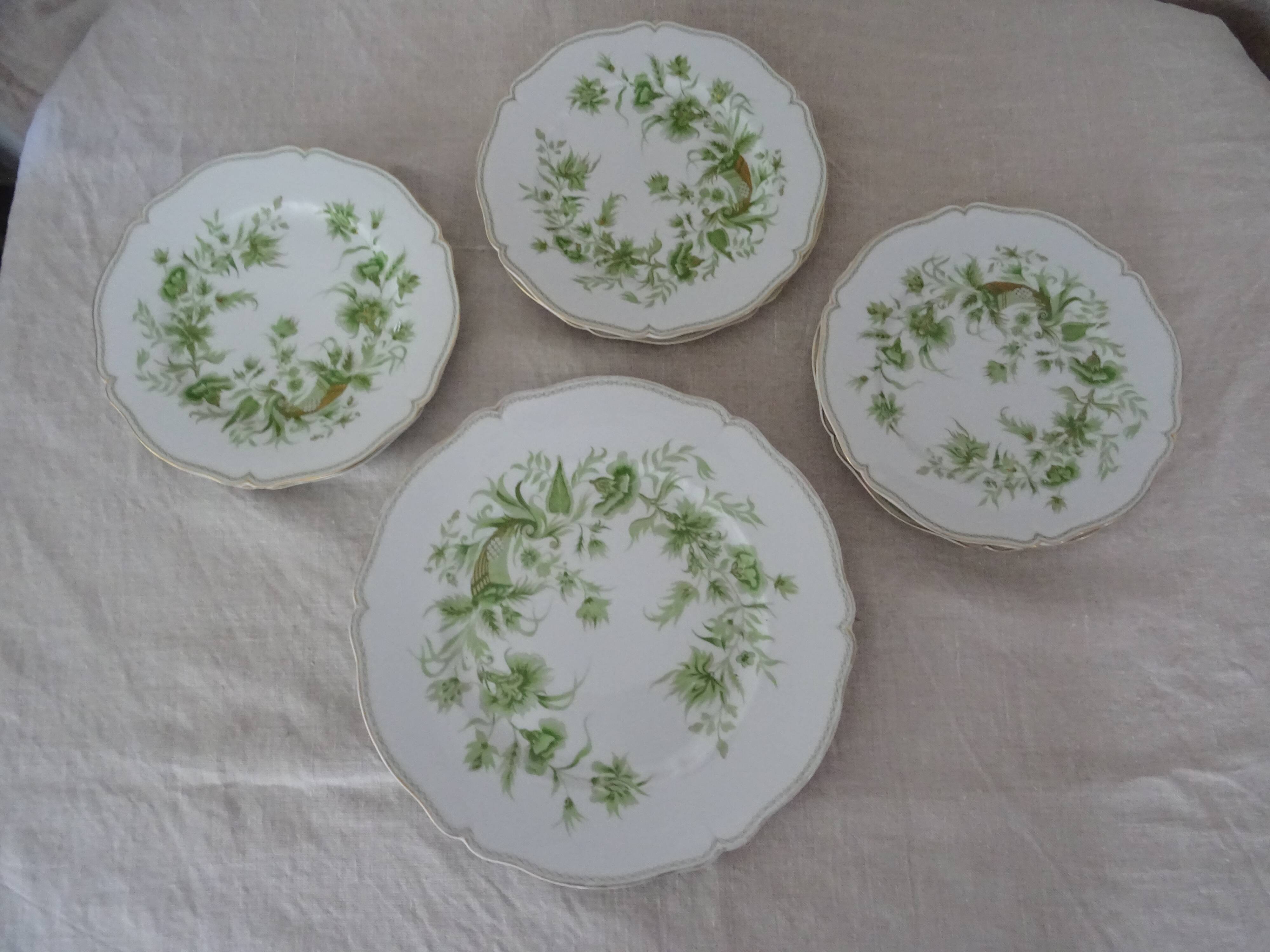 6 flat plates and 1 round dish haviland limoges with green and gold horn