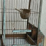 Ancient bird cage in wood and metal