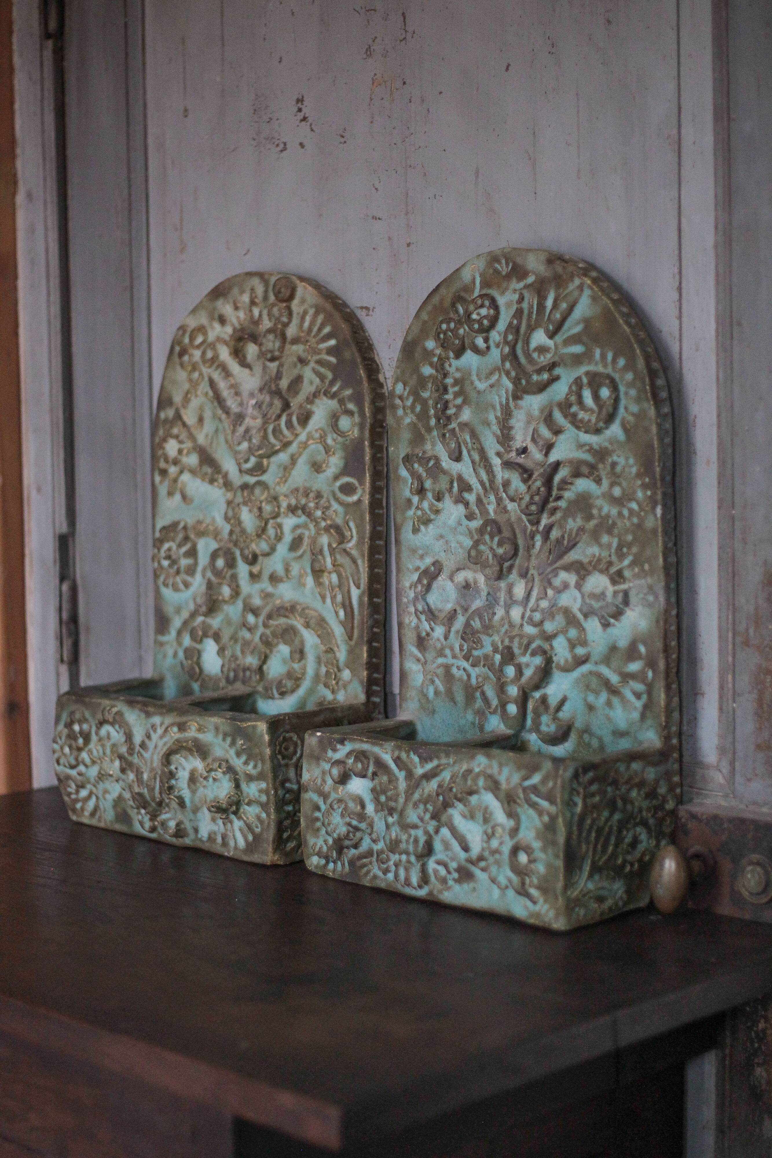 Pair of signed ceramic wall planters, pot cover