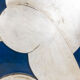 Relief panel "The Acrobat" in silver on a blue background. Contemporary.