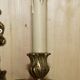 Pair of antique wall sconces from the 1920s in gilded bronze.