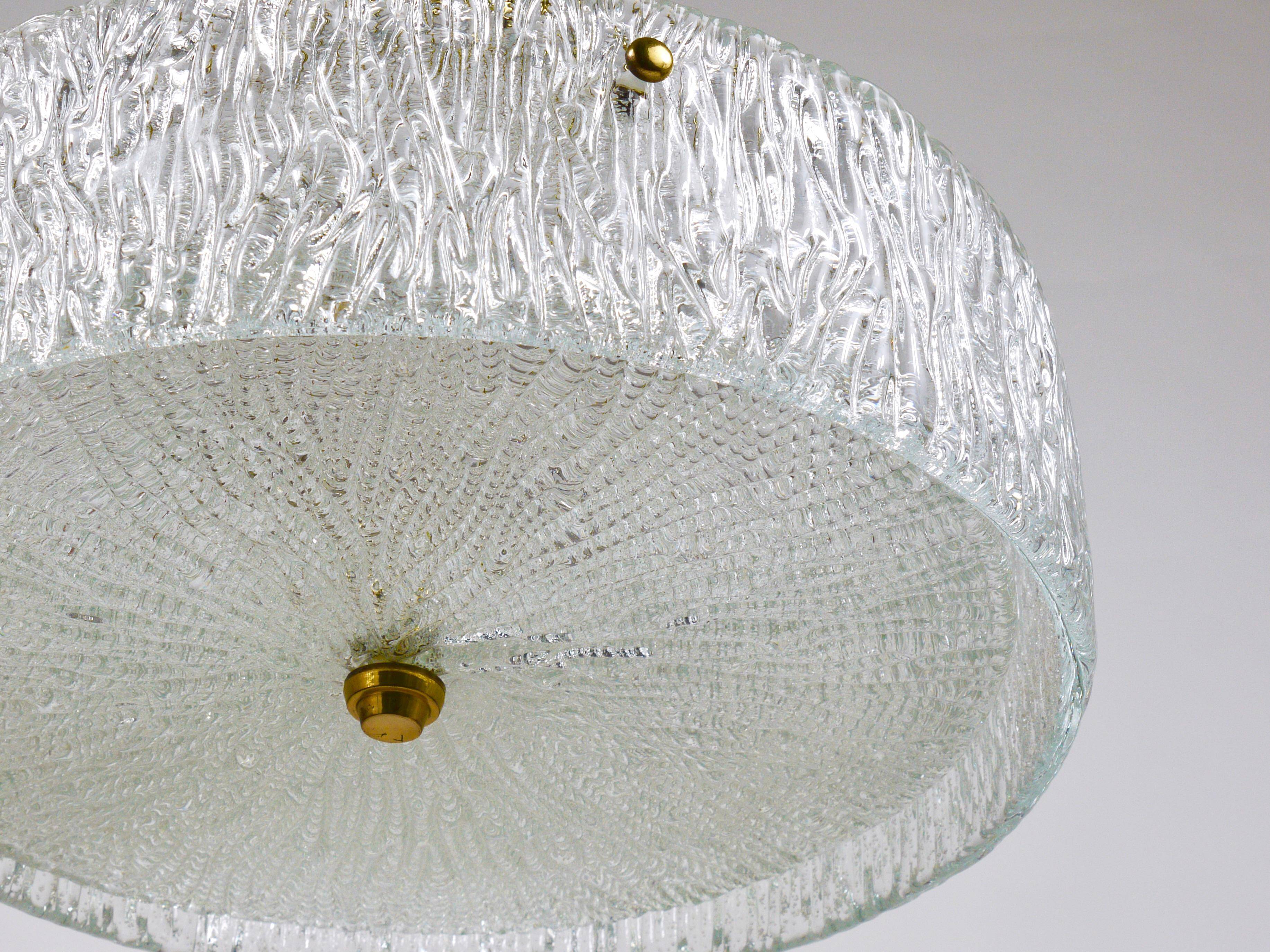 J.T. Kalmar Lustre pendant light in brass and textured glass, 1950s