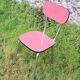 Old red formica chair
