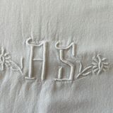 Old bolster case with lace edge and embroidered.