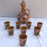 Old carafe with 8 ceramic glasses