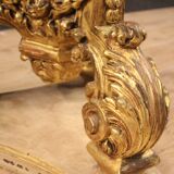 Italian lacquered and gilded round coffee table with glass top