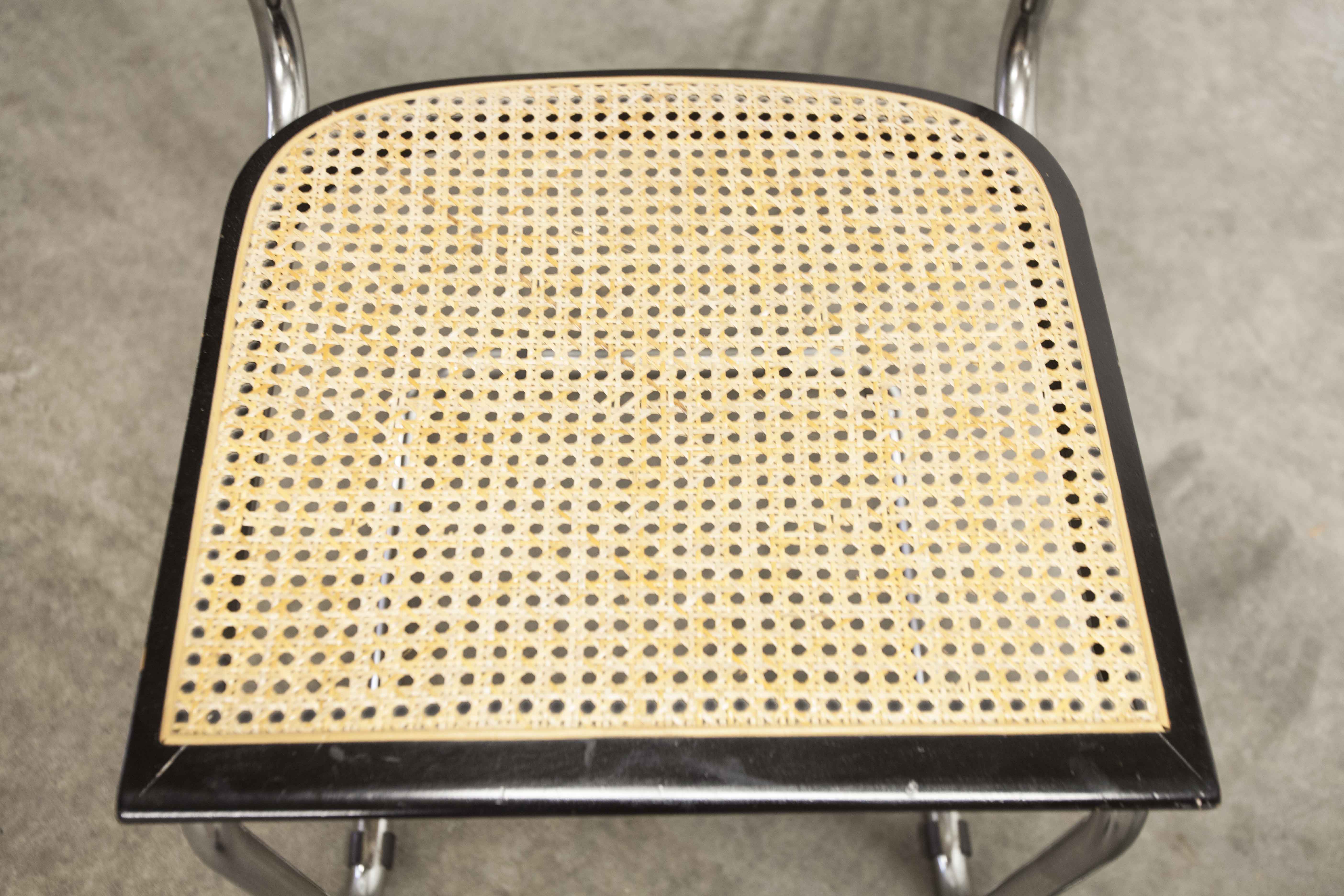 Pair of black Breuer b32 chairs and cannage