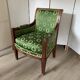 Fauteuil de style Empire en bois et tissu vert