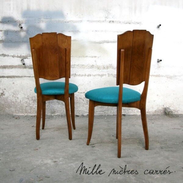 A set of 6 completely renovated turquoise chairs.