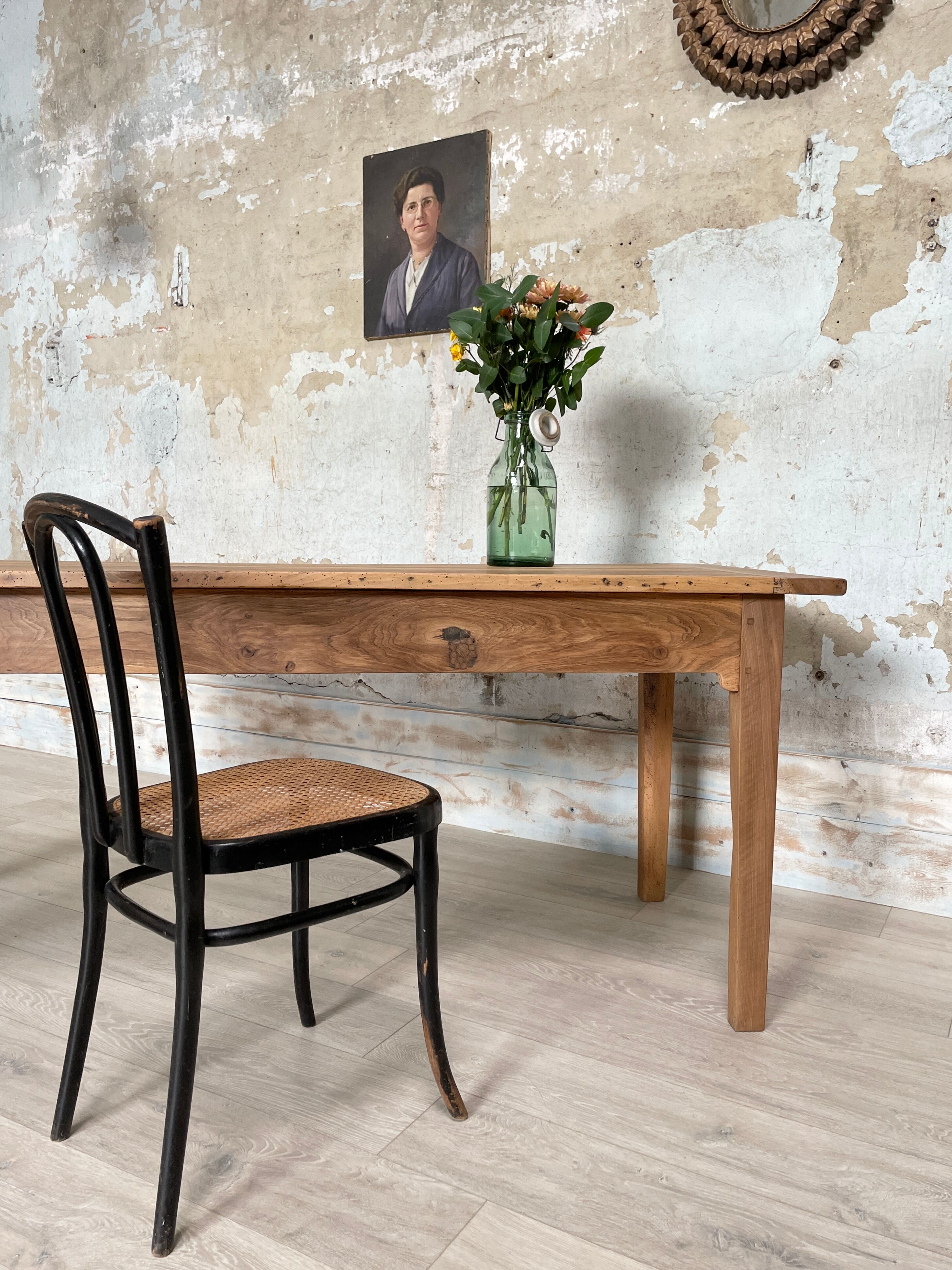 Vintage farmhouse table with spindle legs.