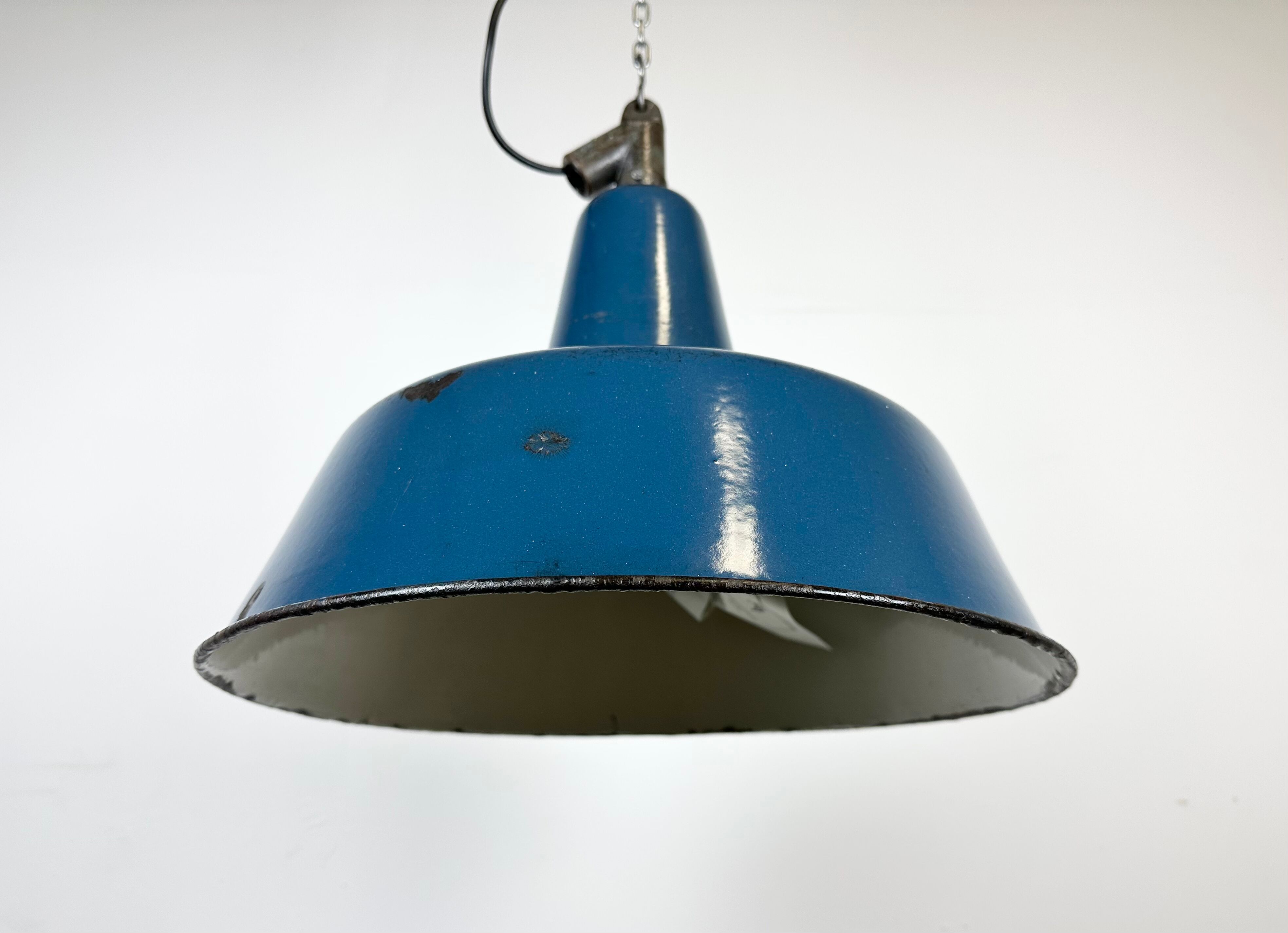 Industrial blue enamel factory lamp with cast iron top, 1960s