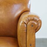 Restored antique Art Deco sheep leather armchair