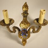 Pair of two-light wall lights in gilded bronze