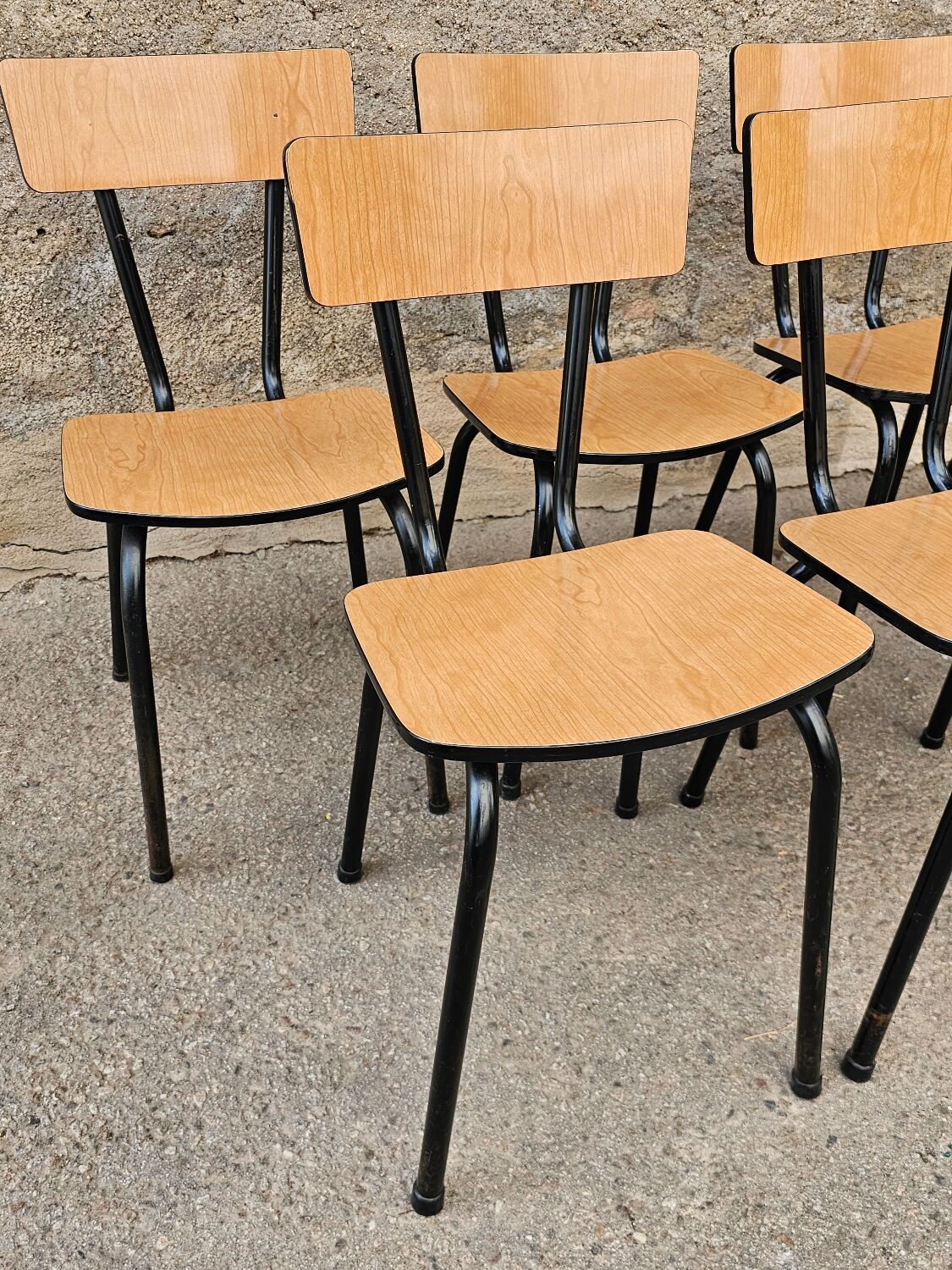 Chairs in black and light brown formica