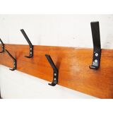 Locker room in gym with rail for coats