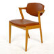 Four Kai Kristiansen oak chairs with new leather upholstery