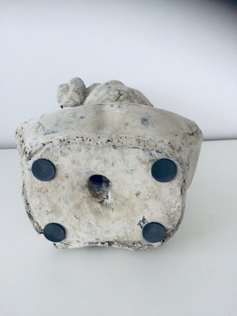 Stone and plaster bust