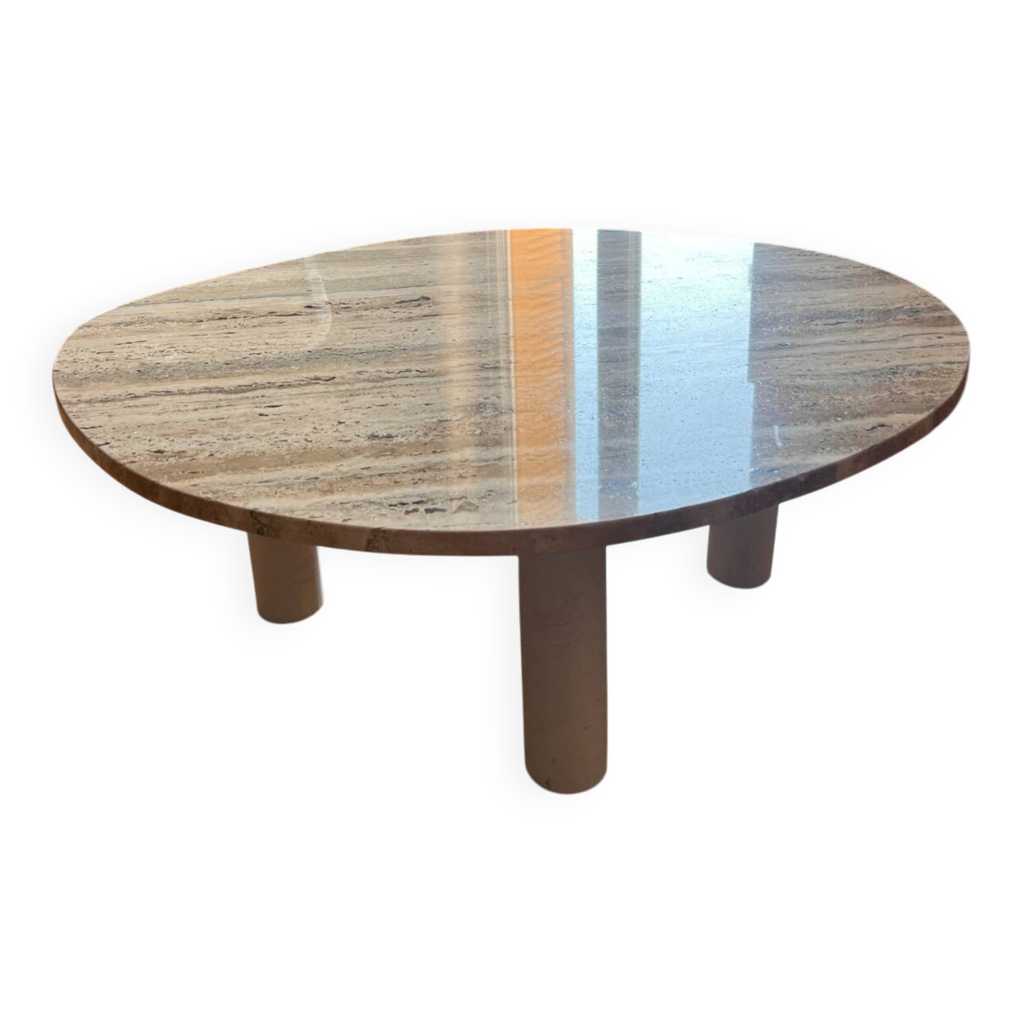 Organic coffee table in travertine.