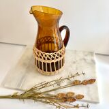 Amber glass and wicker carafe
