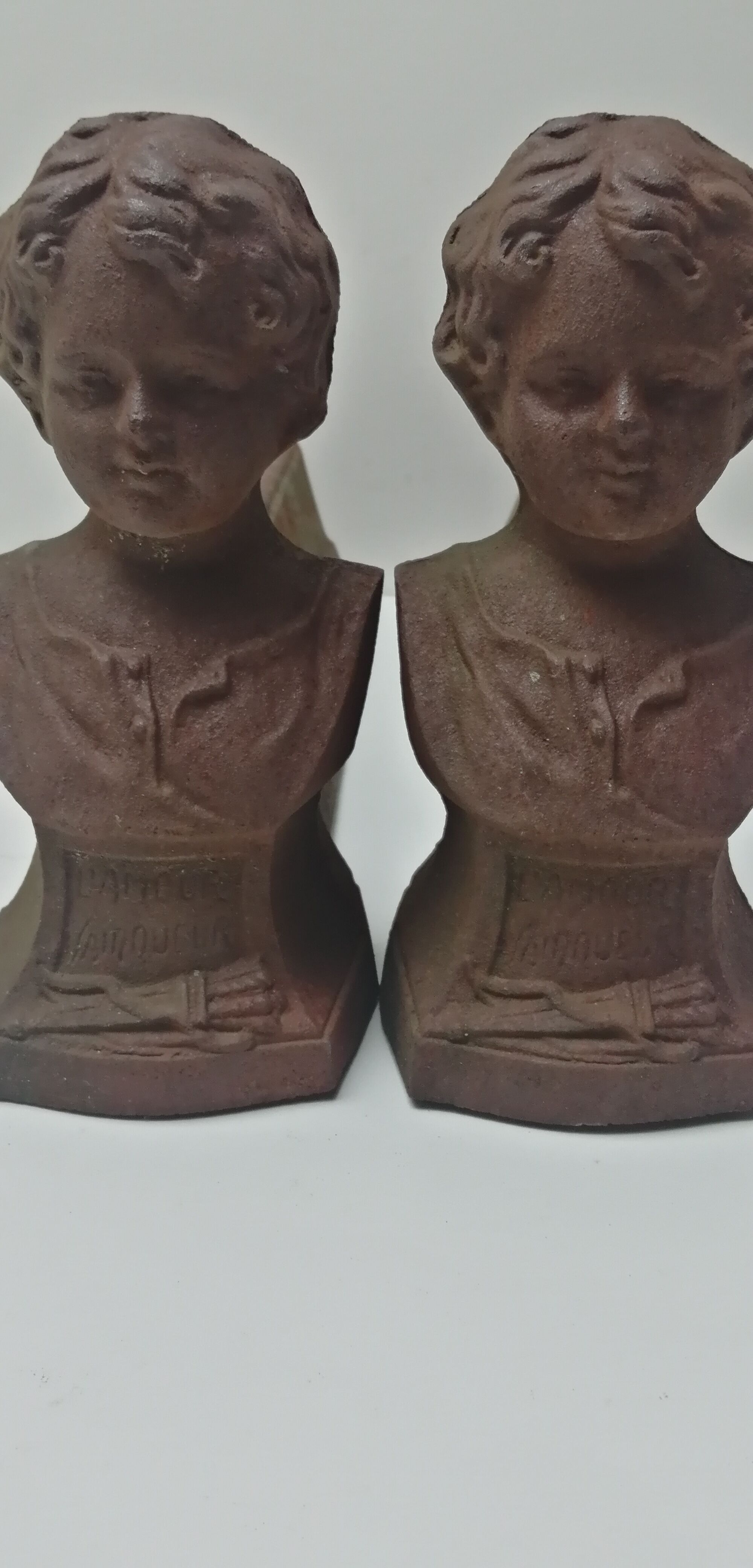 Pair of cast iron fireplace chenets "children"
