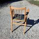 Compass leg armchair