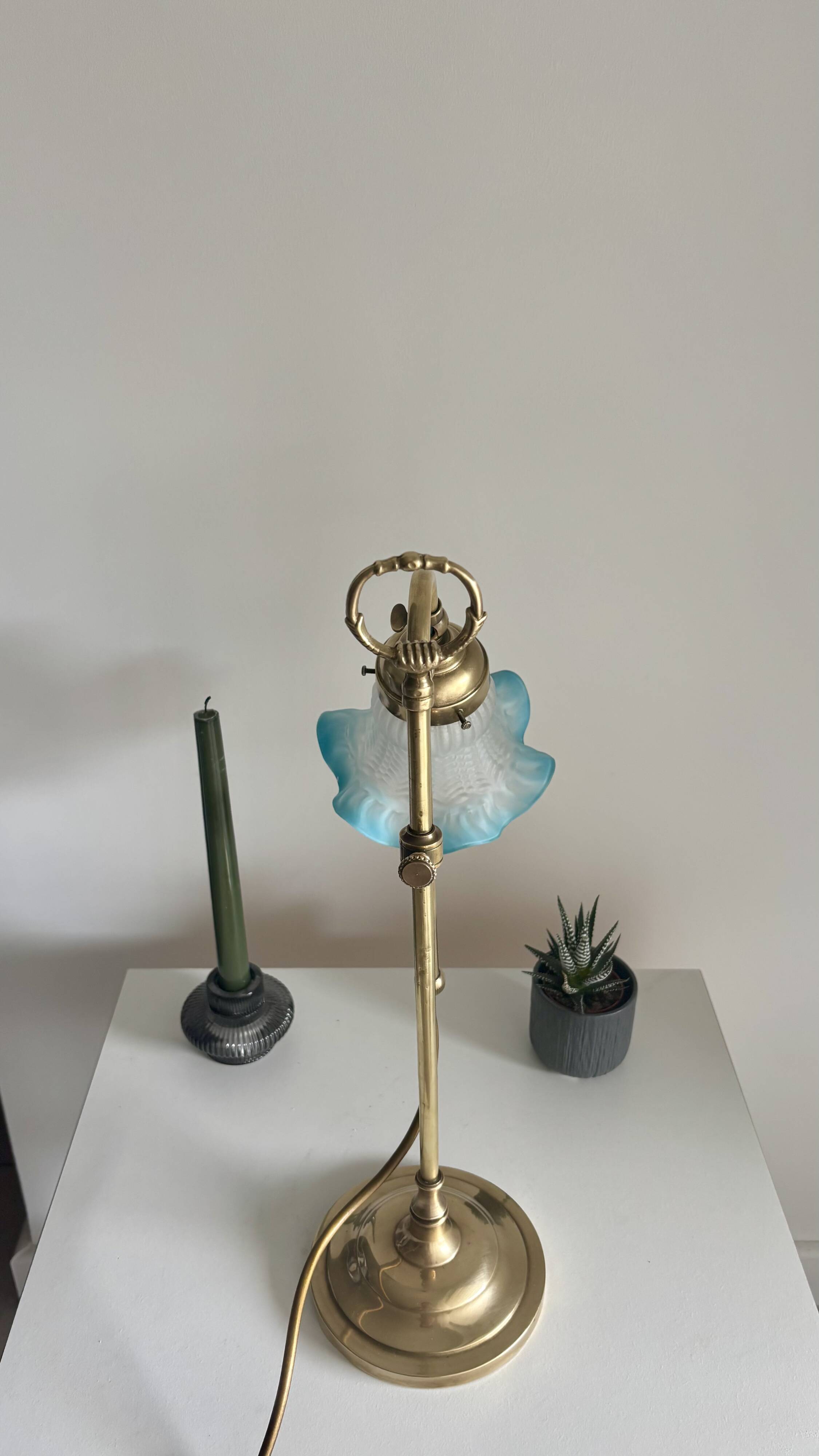 Art Nouveau style gilded brass lamp with sky blue opaline tulip