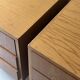 Pair of modernist honey wood bedside tables, 1950 design.