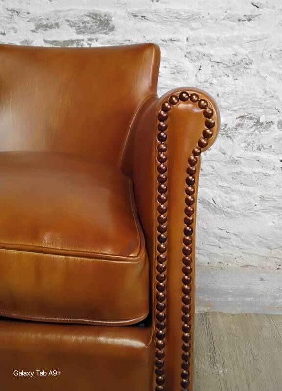 Living room sofa and its 2 club armchairs.