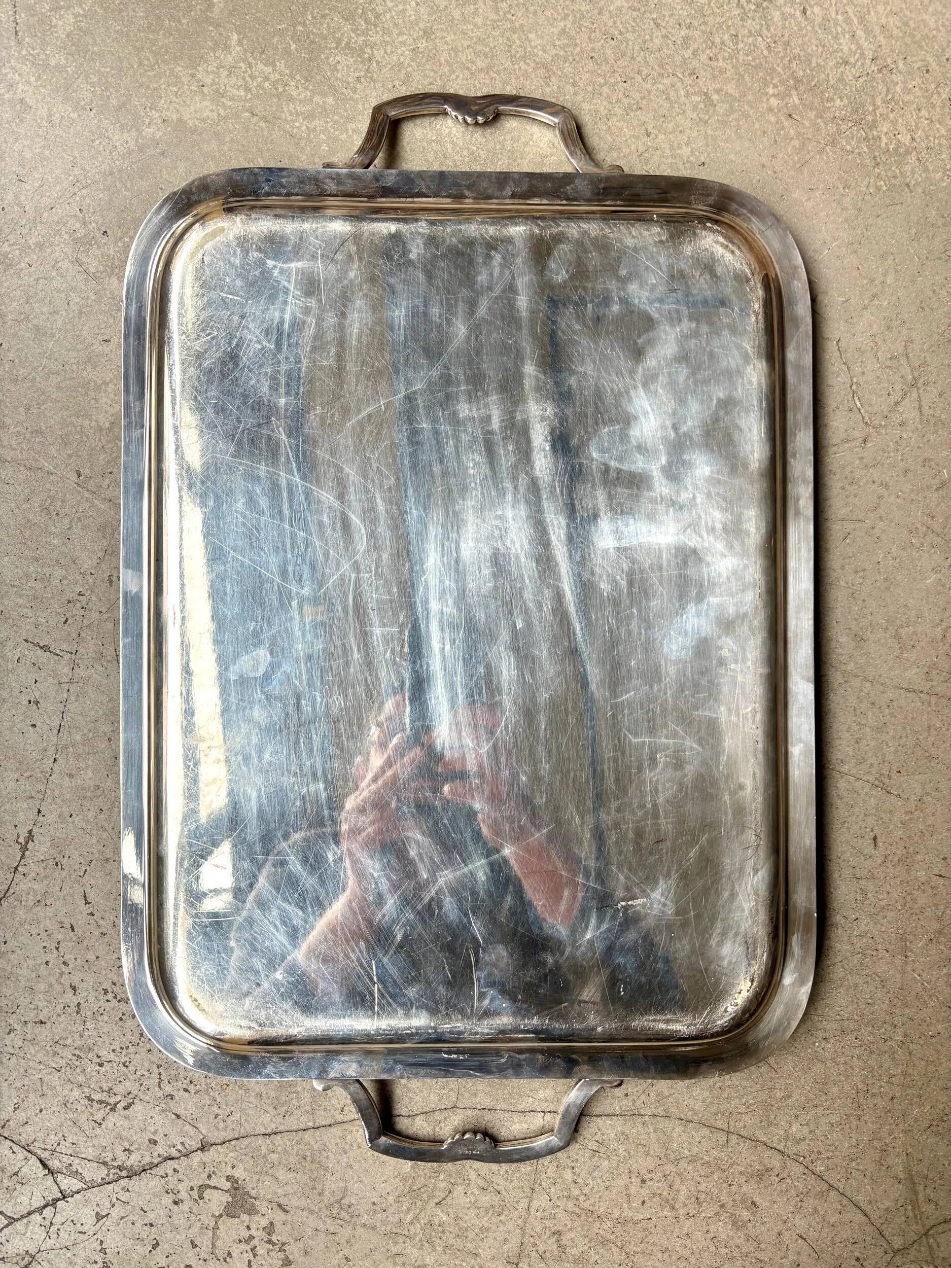Rectangular silver-plated metal tray with a striated and shell design