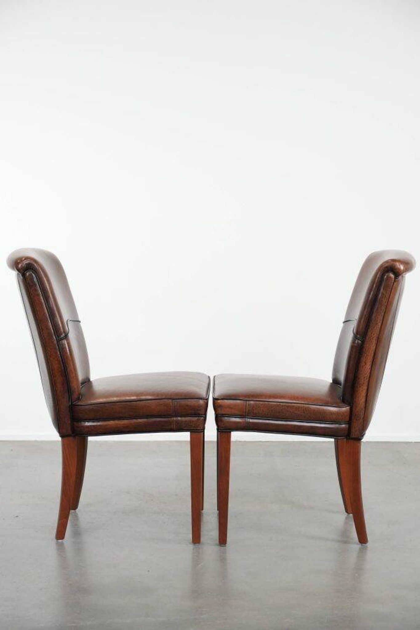 Comfortable set of 2 sheep leather dining chairs with character