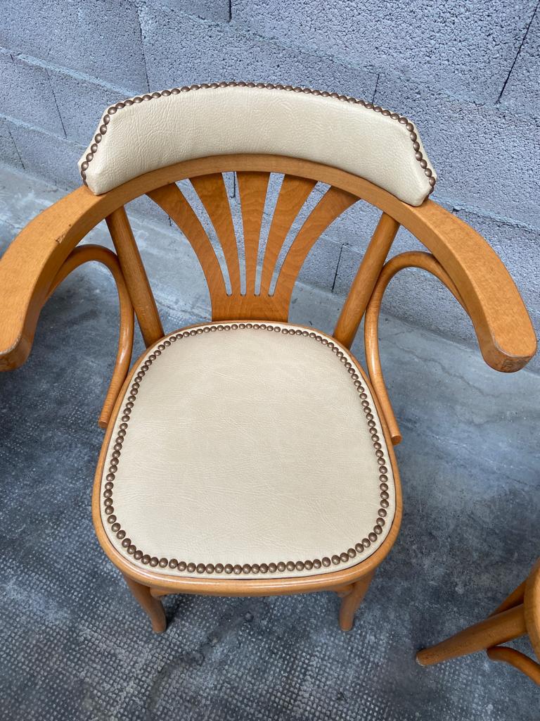 Pair of vintage curved wood restaurant armchairs
