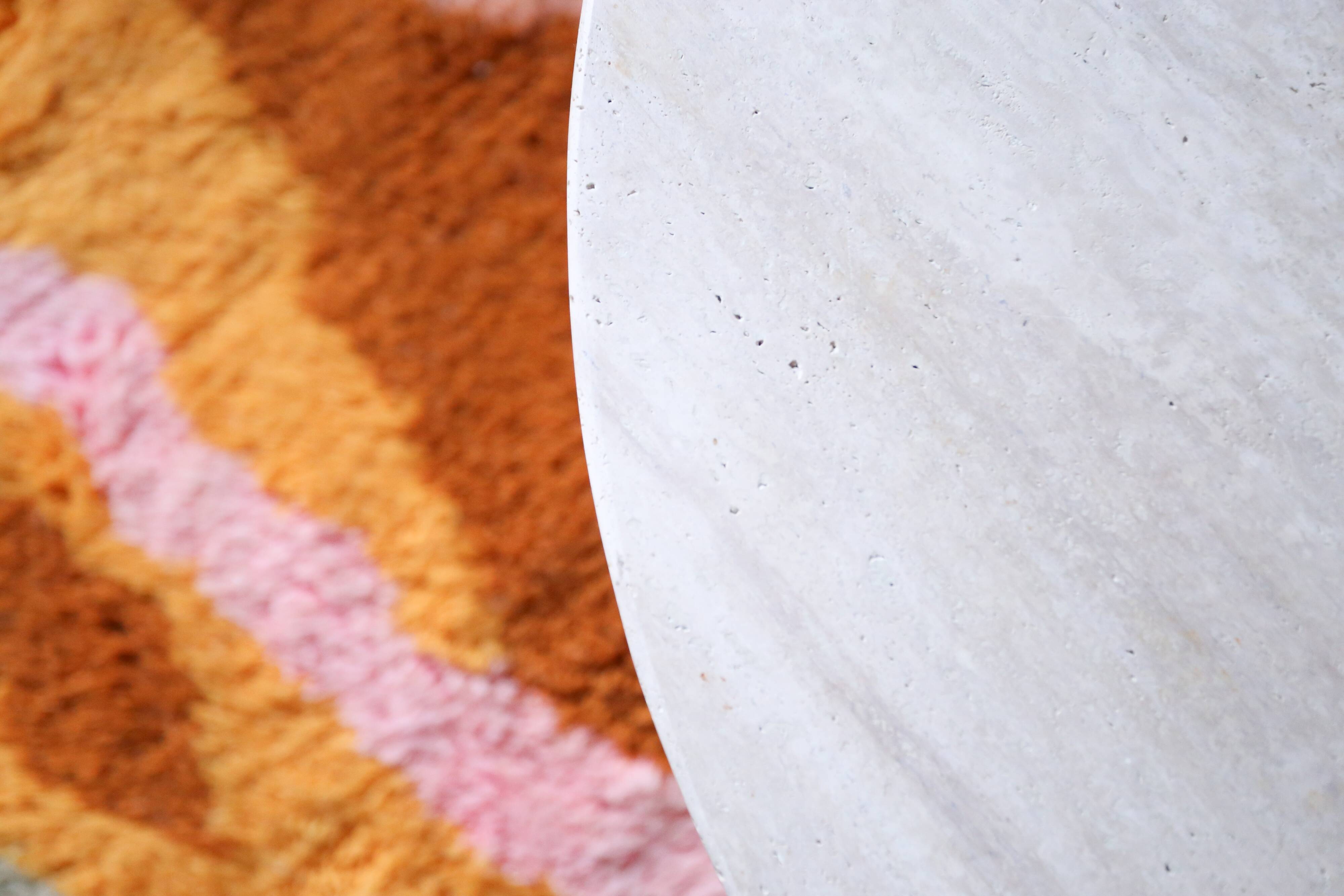 Oval travertine coffee table