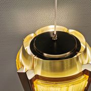 Danish hanging lamp, made in brass colored and brown metal, with yellowish hard pressed plastic deta