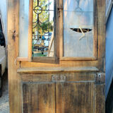 Oak entrance door at double chassis opening