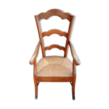 Old straw armchair
