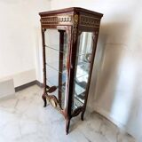 Louis XV style display cabinet in wood and bronze, with several shelves