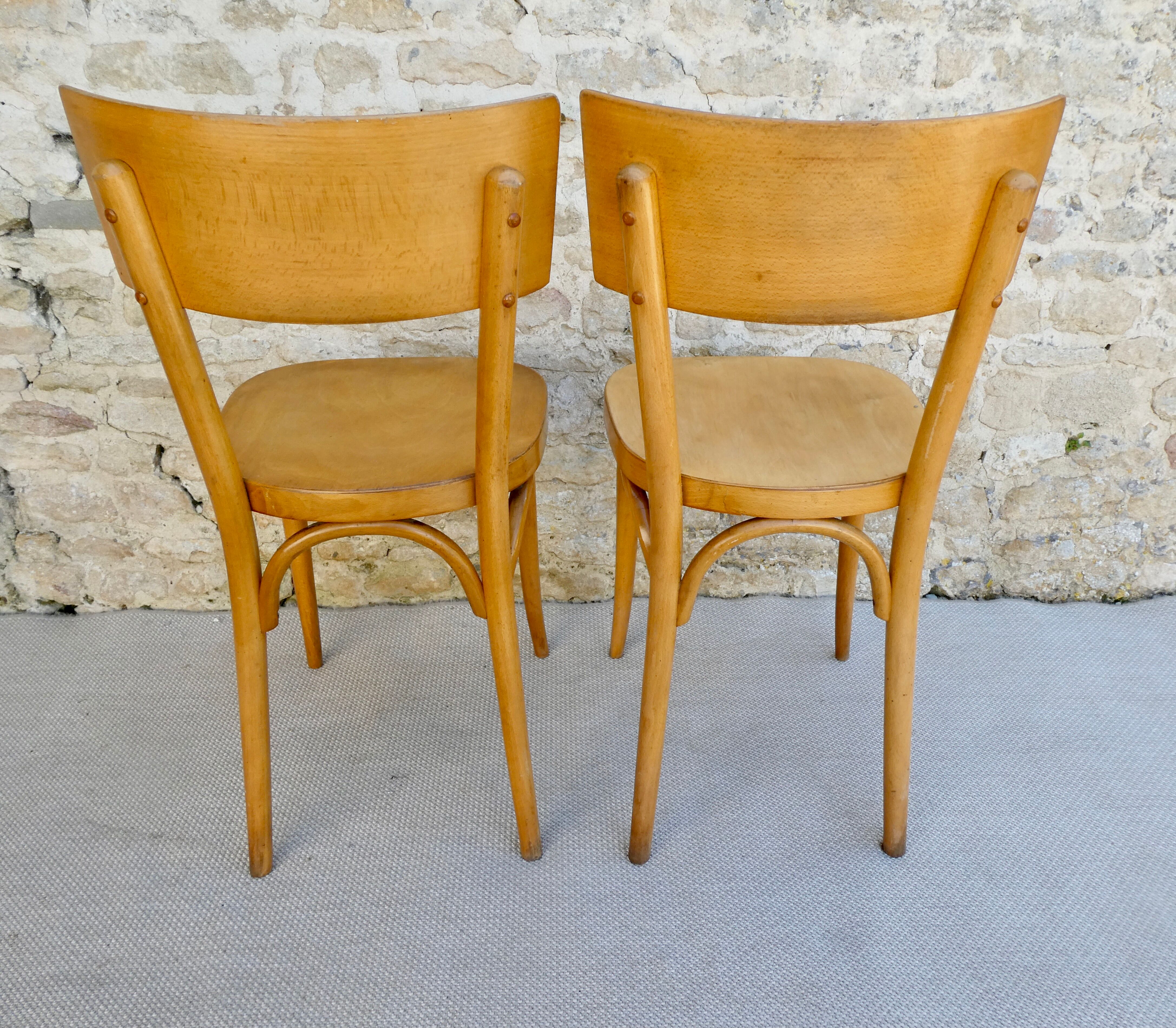 Pair of Baumann bistro chairs in light wood