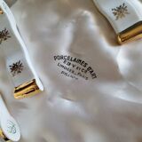 12 Limoges art porcelain knife rests in their case