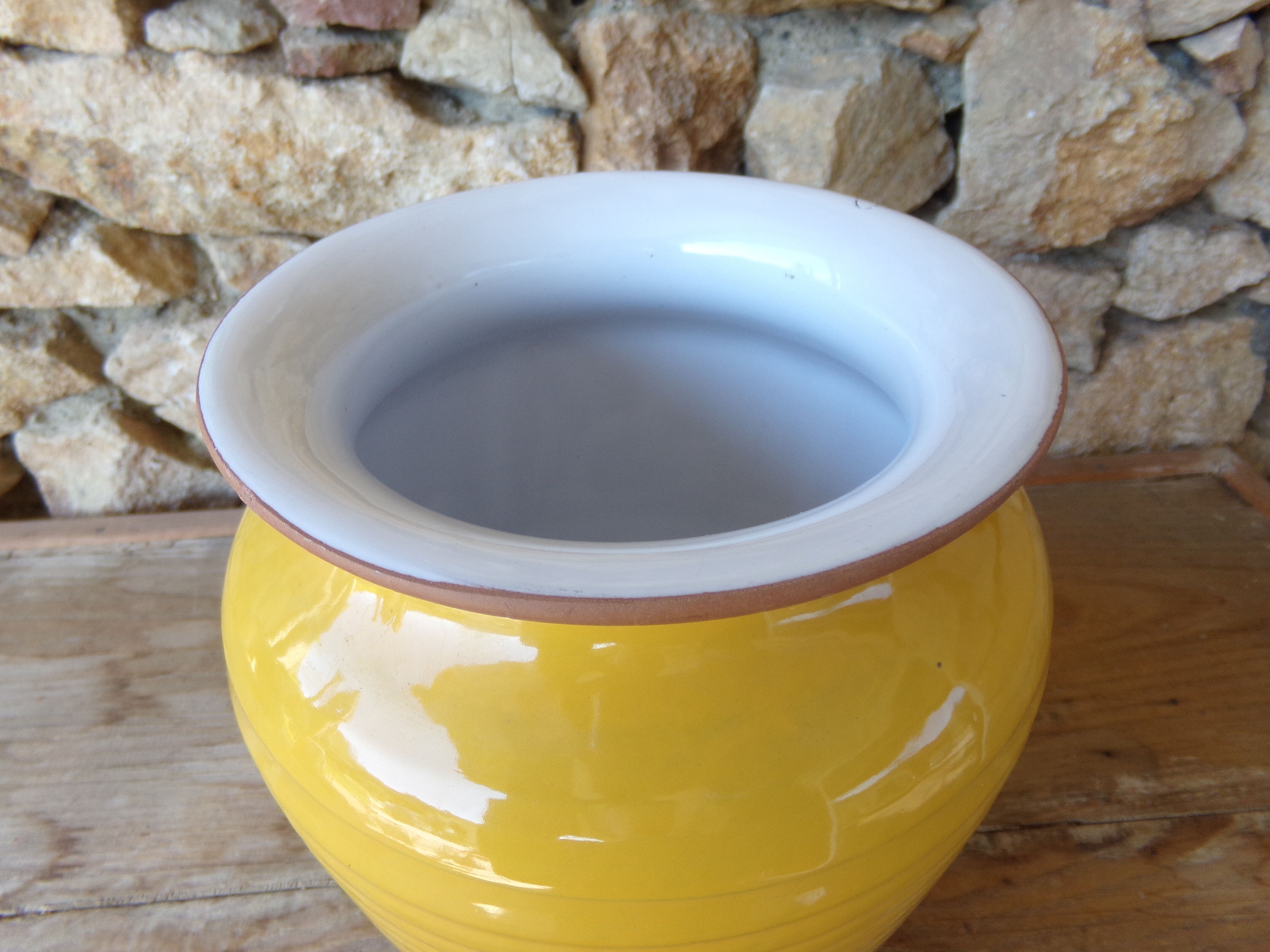 Yellow glazed earth vase