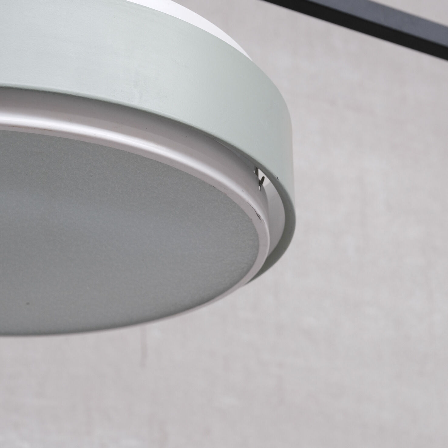 Mid-century steel and glass pendant by RAAK