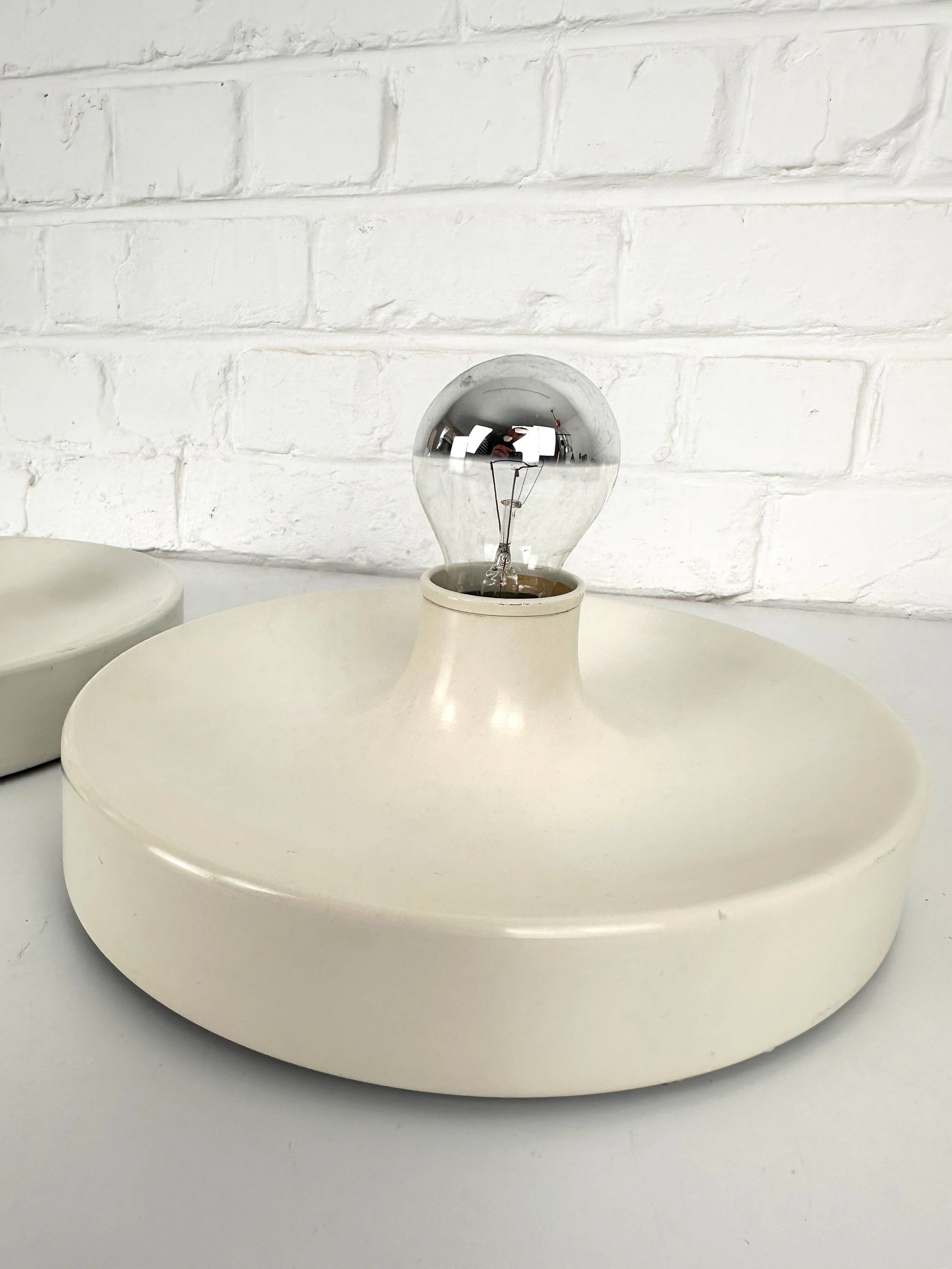 Pair of wall lights selected by Charlotte Perriand, Germany 1960