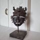 African bronze mask on pedestal, from Ivory Coast, dating