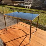 Brass side table with smoked glass.