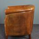 Club armchair in cognac-colored sheepskin