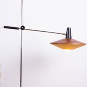 Large tilting floor lamp in steel and teak by Georges Frydman 1960.