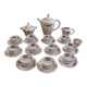 Coffee and tea service in Limoges porcelain with anemone flower pattern and gilding.
