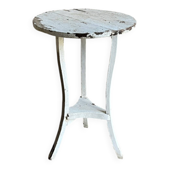 Small side table with an antique finish