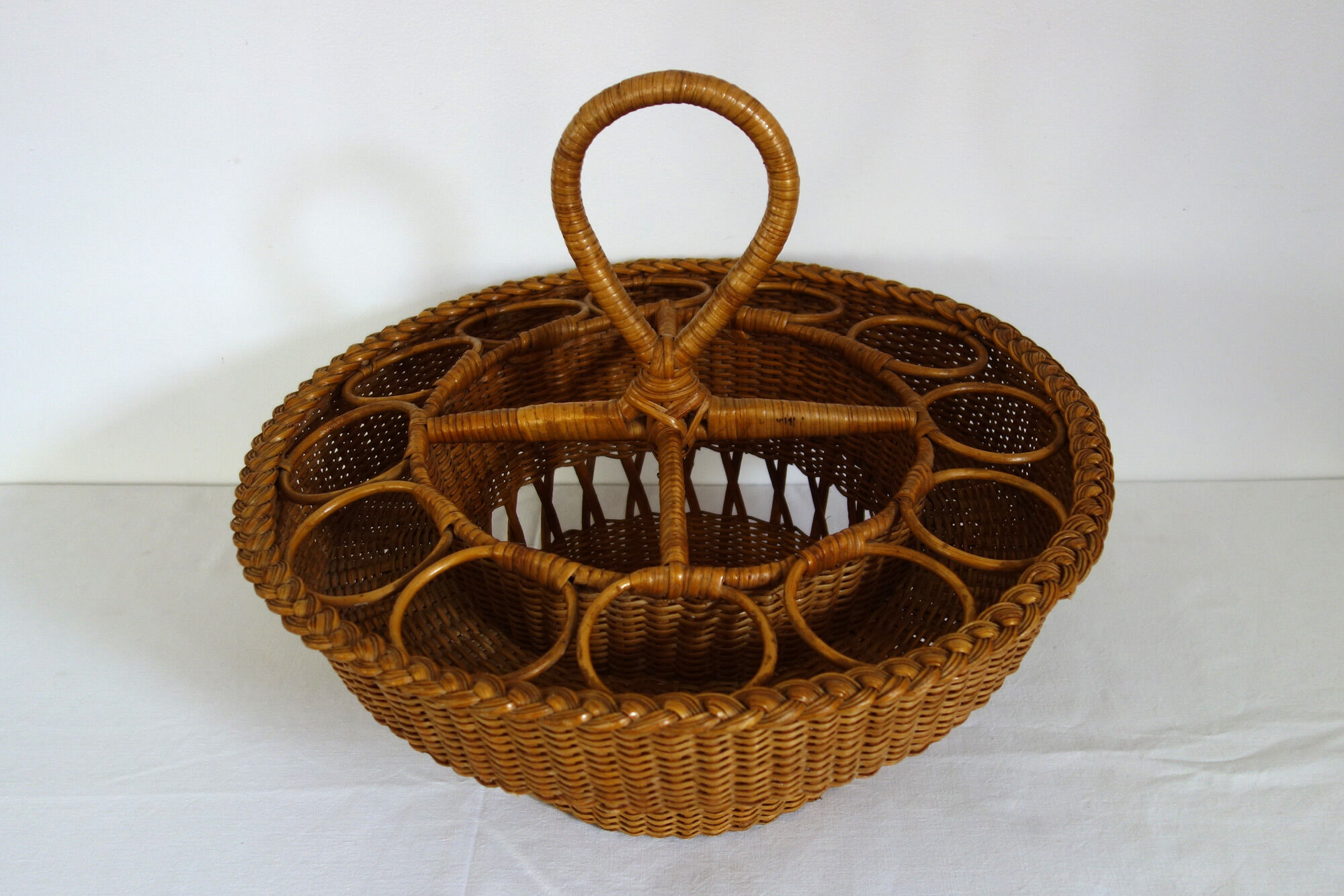 Old bottles and glasses holder wicker vintage aperitif