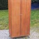 Vintage oak wardrobe with metal legs from the 1950s.