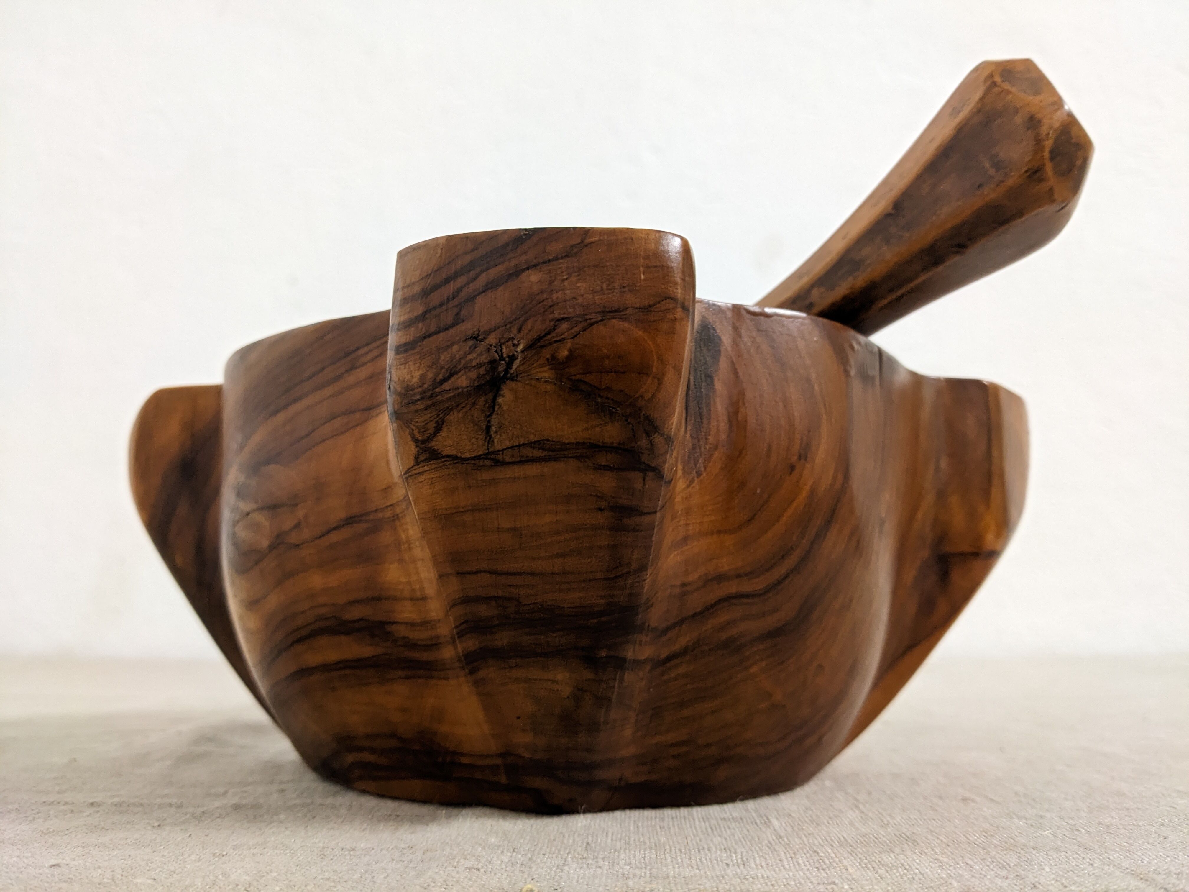 Mortar and its vintage olive wood pestle